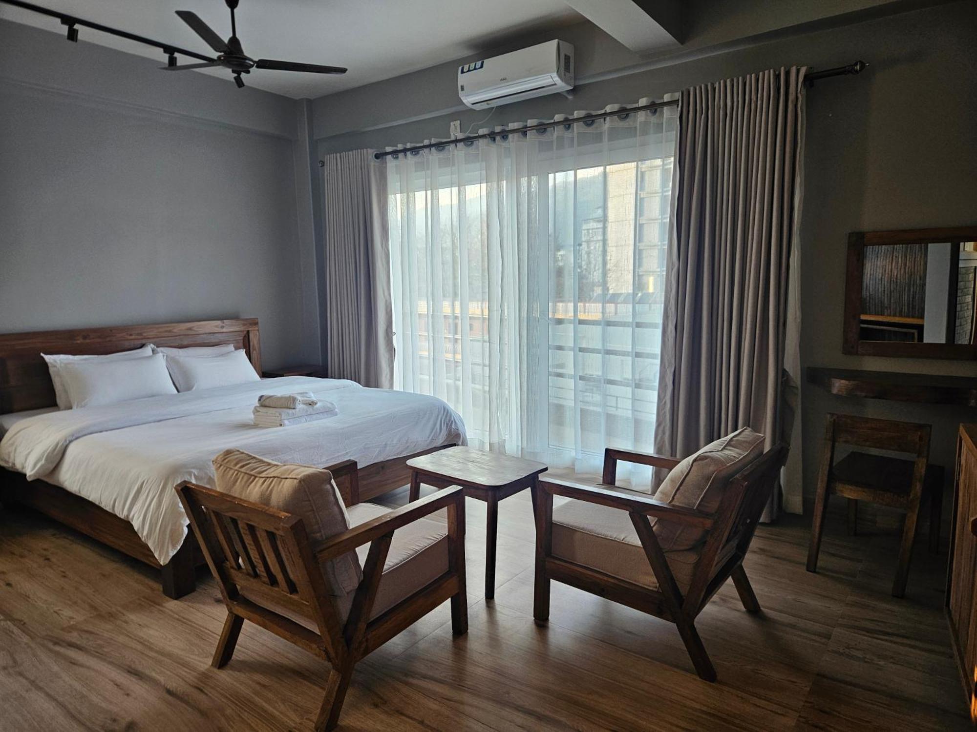 Hotel Blossom Pokhara Szoba fotó